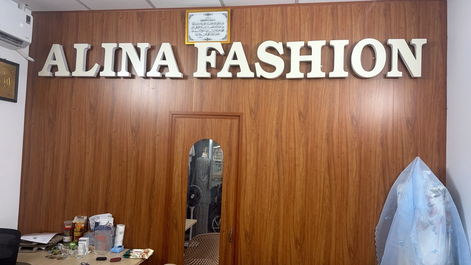 Alina Fashion sign inside the Vietnam shop